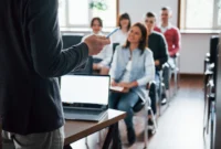 everyone is smiling listens group people business conference modern classroom daytime 146671 16288